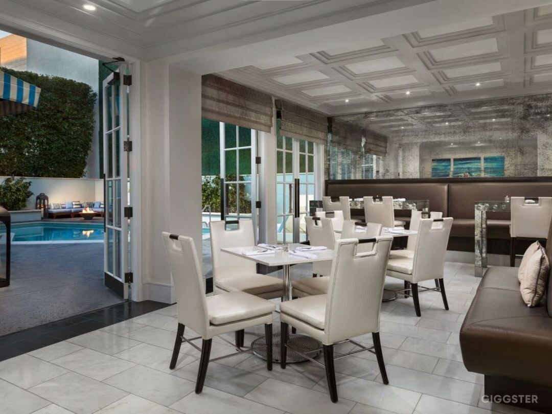  Bistro Mosaic, overlooking the serene private pool, combines chic, contemporary design with a casual luxe vibe, offering a picturesque and sophisticated backdrop perfect for any film or photo production. 